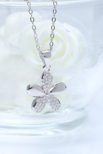 large silver flower pendant