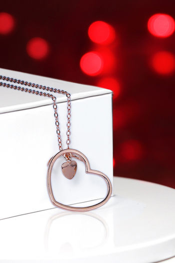 neha kakkar rose gold heart pendant with link chain