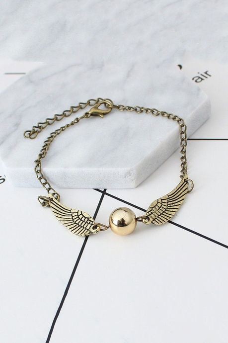 Buy Yellow Chimes Harry Potter Snitch Ball with Wings Gold Plated